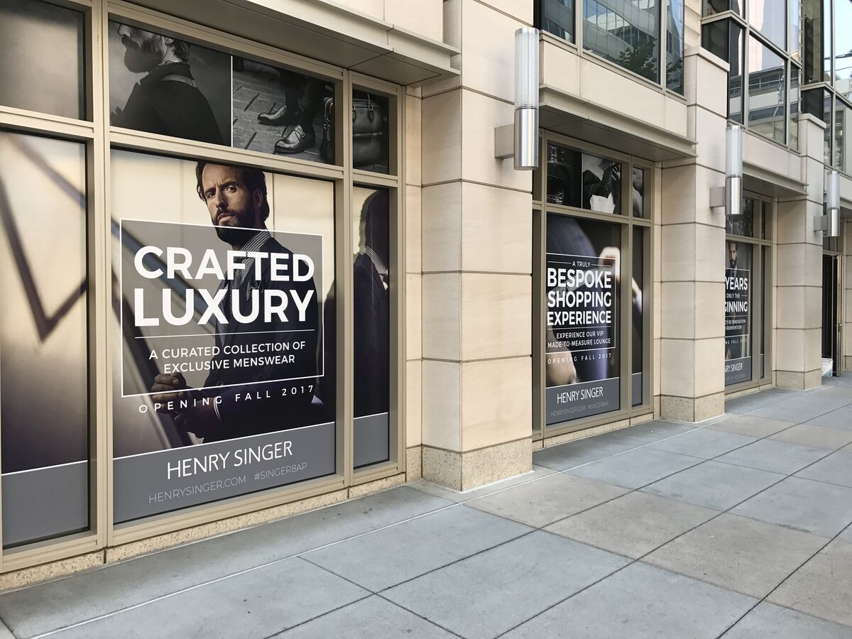 Crafted Luxury and Bespoke Shopping Experience window wraps at street level