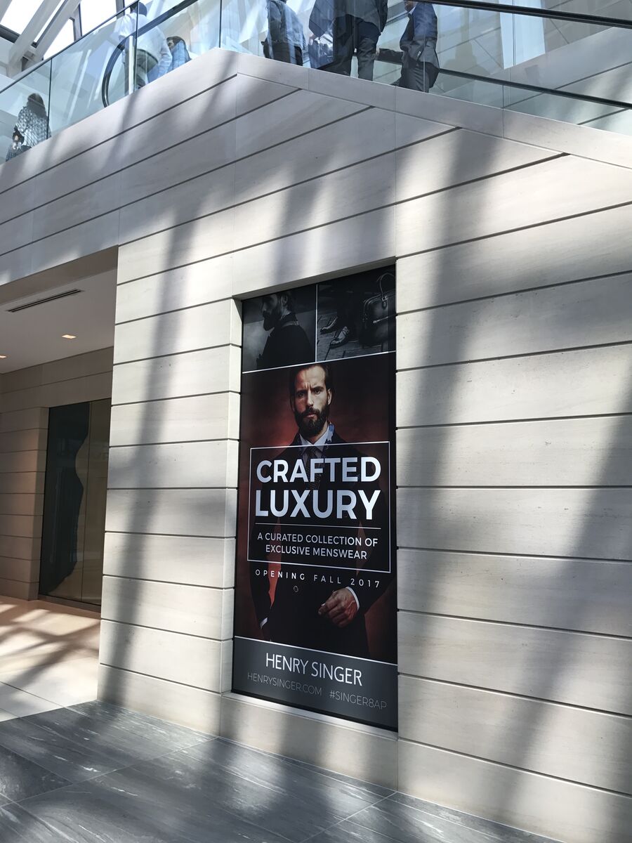 Crafted Luxury wrap in the 8th Avenue Place atrium