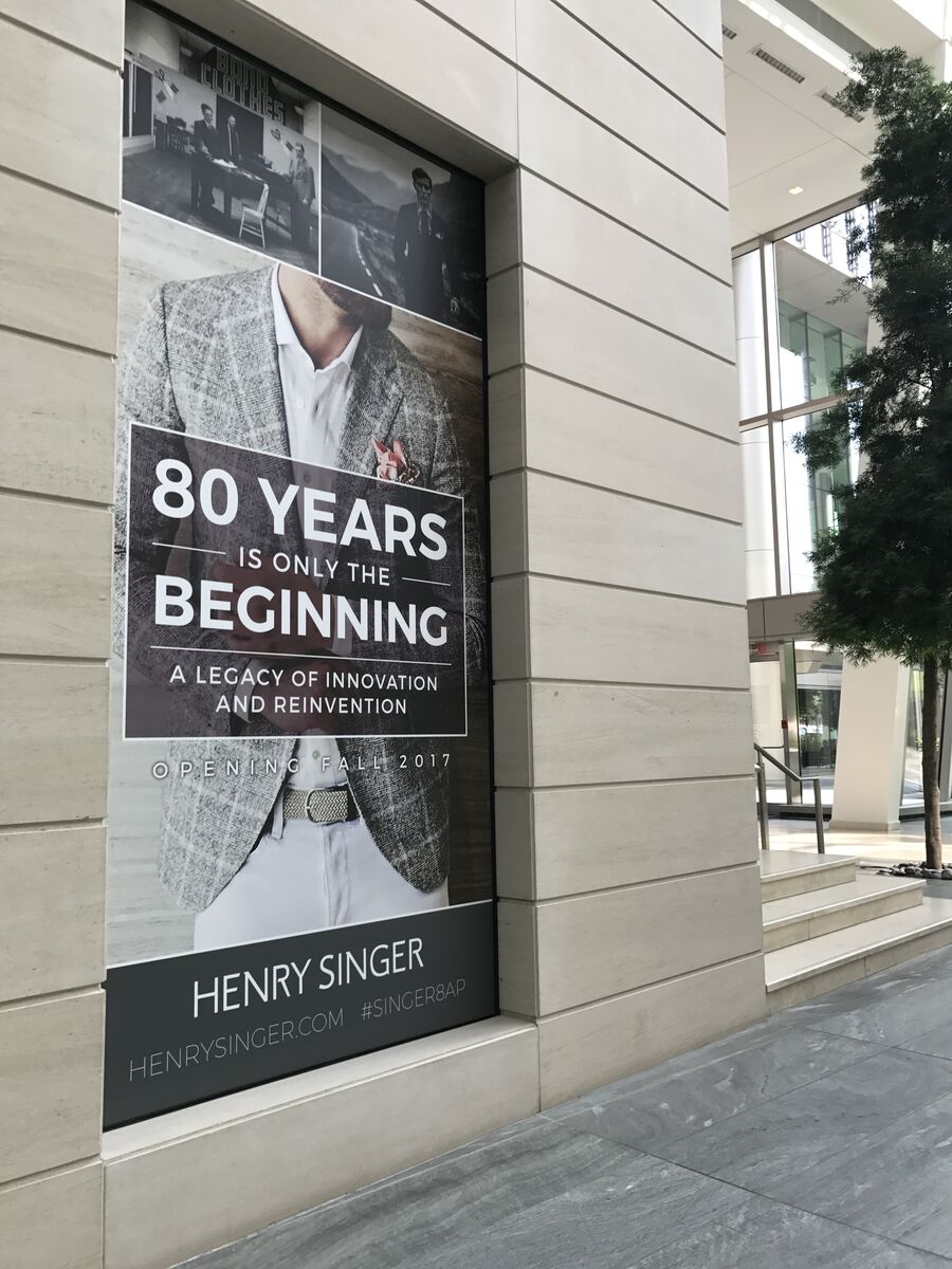 80 Years Is Only the Beginning wrap in the atrium
